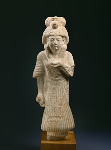 Schrijver en priester van Thoth die een baviaan draagt, uit Ashmunein (oud Hermopolis)